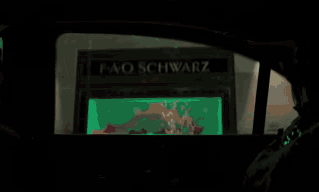 a blurred image of a sign that says ao schwarz