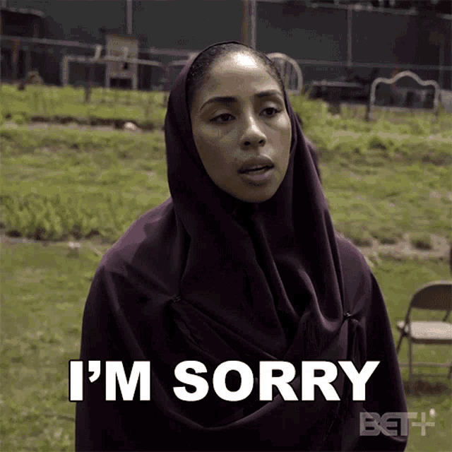 a woman in a hijab says i 'm sorry in a bet advertisement