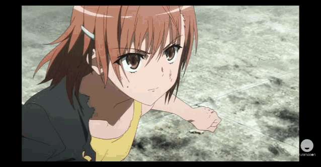 a picture of a girl with a yellow tank top and a black jacket is being displayed on a screen