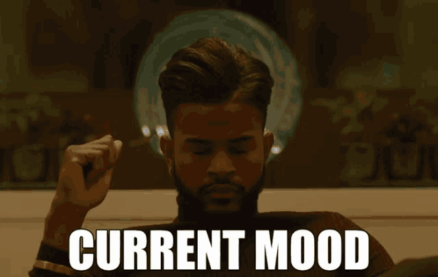 a man with a beard is making a funny face with the words current mood above him