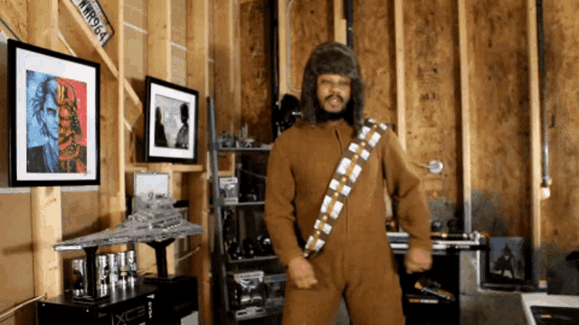 a man in a chewbacca costume is dancing