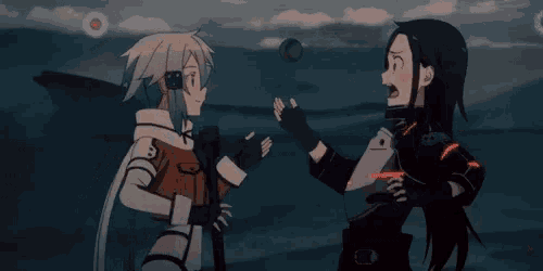 a couple of anime characters are standing next to each other .