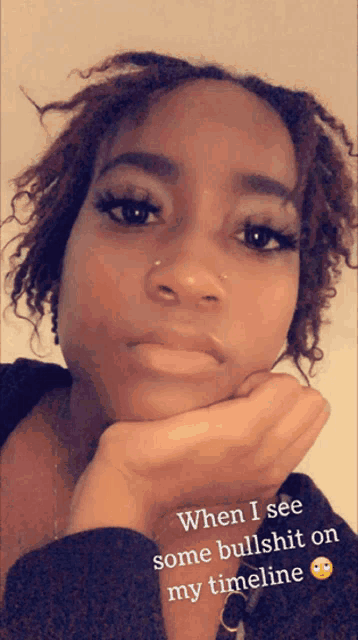 a woman with her hand on her chin and the words when i see some bullshit on my timeline