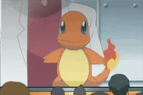 a cartoon character is standing in front of a group of people and holding a fireball in its hand .