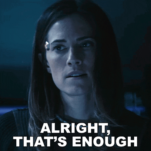 a woman says alright that 's enough in white letters