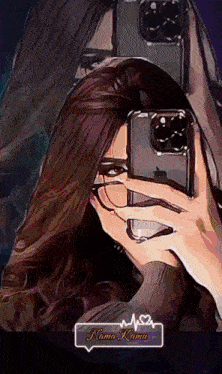 a woman is taking a picture of herself with her phone and the name kamu is on the bottom