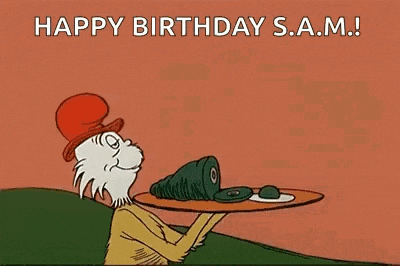 dr. seuss 's cat in the hat is holding a tray of food and saying `` happy birthday sam ! ''