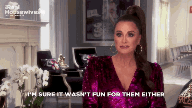 a woman in a purple dress says i 'm sure it was n't fun for them either