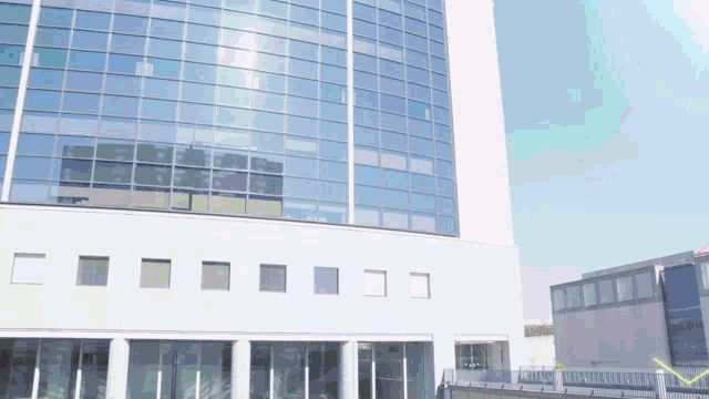 a large building with a lot of windows and a sign that says ' a ' on it