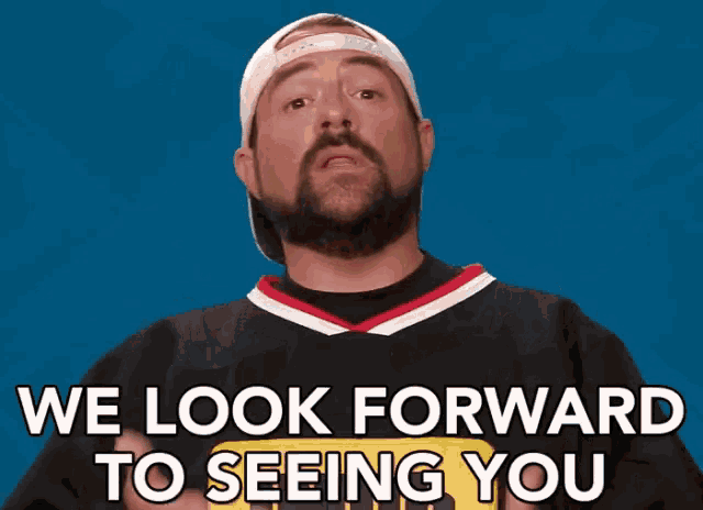 a man with a beard is wearing a jersey that says " we look forward to seeing you "