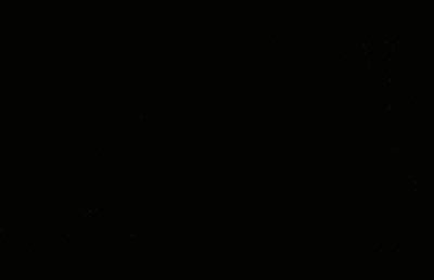 a couple of men are standing next to each other in a room in space .