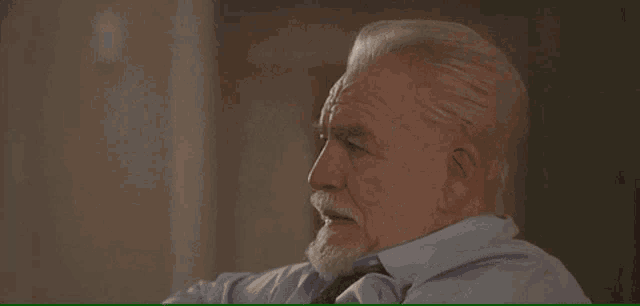 a man with a beard is sitting down and says time for a blood sacrifice .