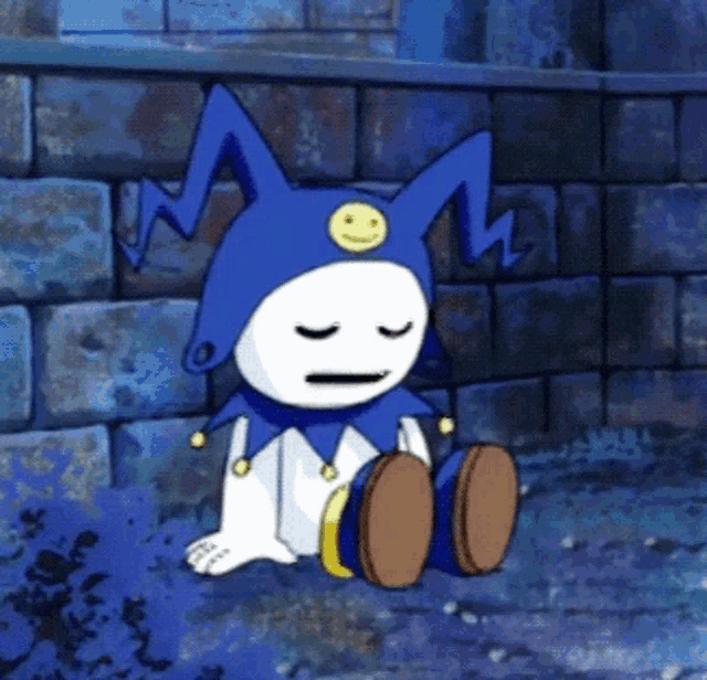 a cartoon character wearing a blue jester hat with a smiley face on it