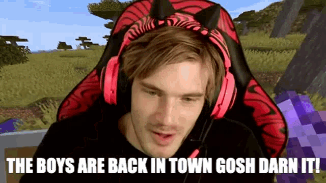 a man wearing headphones is playing a video game and says " the boys are back in town gosh darn it "