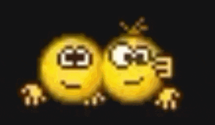 two pixelated smiley faces are giving a thumbs up sign .