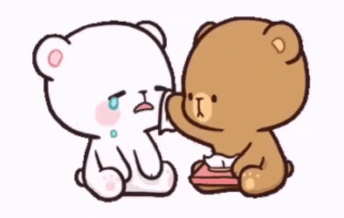 two teddy bears are sitting next to each other and one is holding a tissue .
