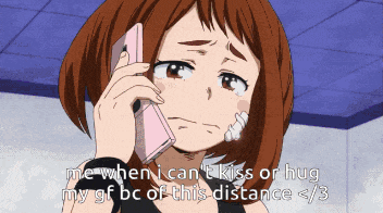 a girl is crying while talking on her cell phone