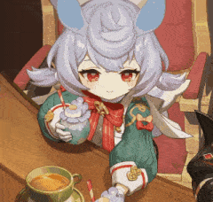 a girl with bunny ears sits at a table with a cup of coffee