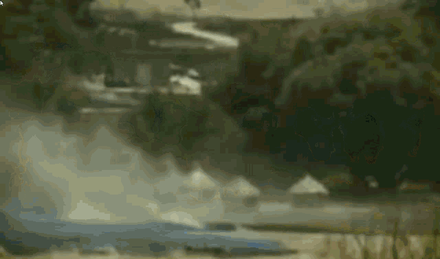 a large amount of smoke is coming out of a waterfall