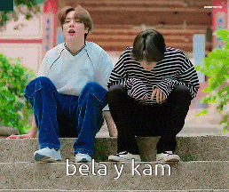 two young men are sitting on a set of stairs with the words bela y kam written above them