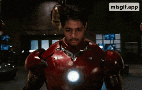 a man in an iron man costume with a misgif.app app icon behind him