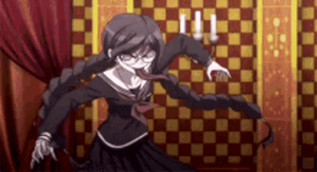 a girl in a school uniform is dancing in a room with a checkered wall .