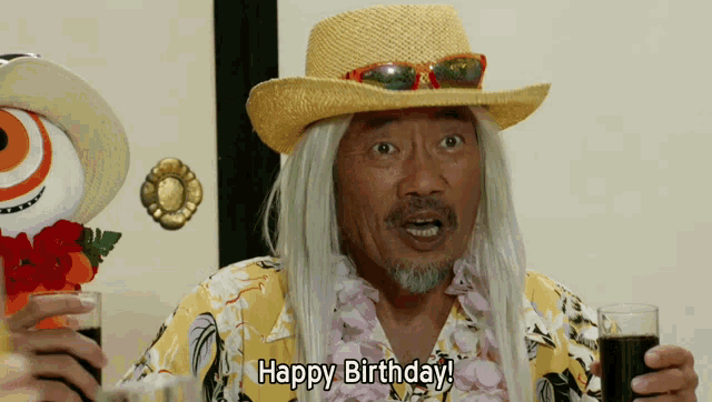a man in a hawaiian shirt says happy birthday