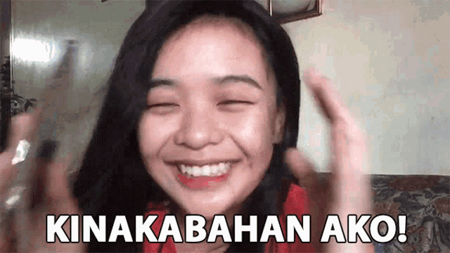 a woman is smiling and making a funny face with the words kinakabahan ako on her face