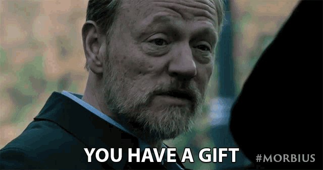 a man in a suit says you have a gift