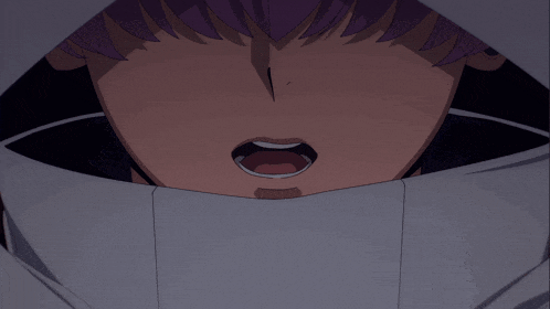 a close up of a person 's face with their mouth wide open