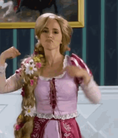 a woman in a rapunzel costume flexing her muscles