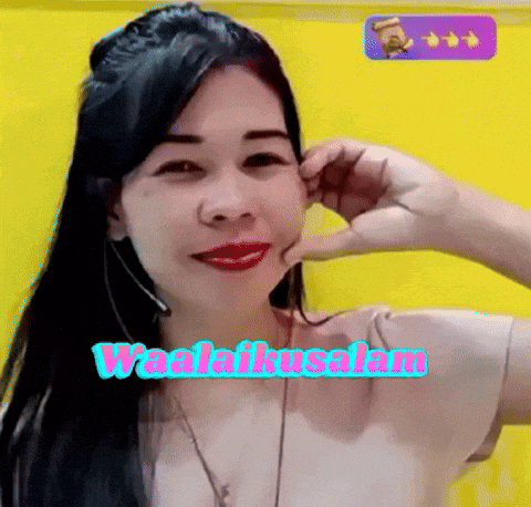 a woman is making a funny face with the words waala kusalam written on the bottom