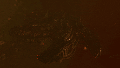 a painting of a monster in the dark with fire coming out of it 's mouth