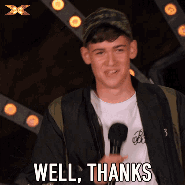 a man holding a microphone with the words well thanks written below him
