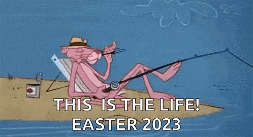a pink panther is sitting on a beach fishing .