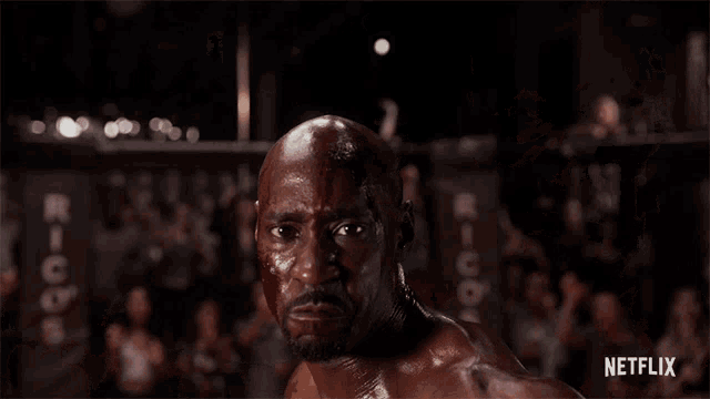 a man in a boxing ring with the word netflix on the bottom right