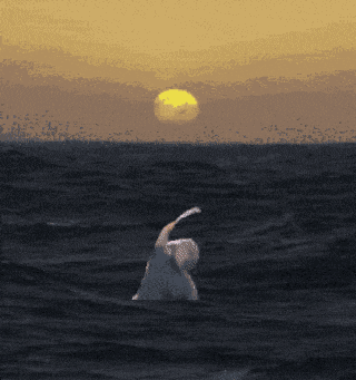 a pixelated image of a person in the ocean with the sun behind them