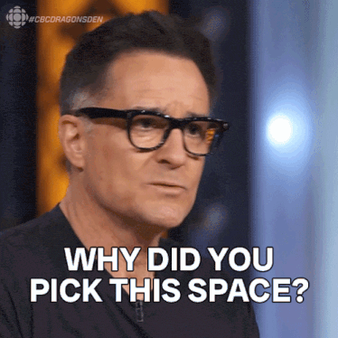 a man wearing glasses is asking why did you pick this space