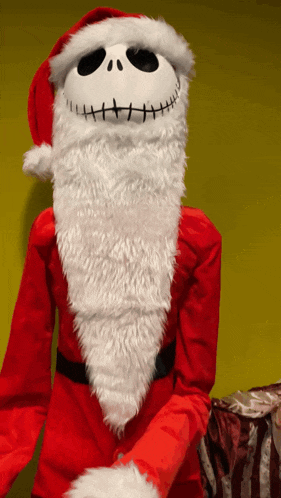 a person dressed in a santa costume with a beard