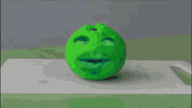 a green object with a black object in it