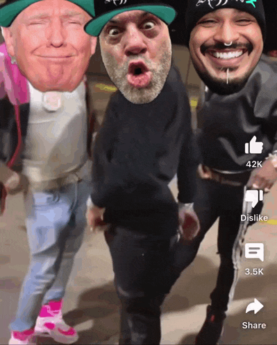 a group of men are posing for a picture and one of them has donald trump on his head