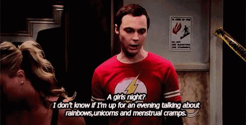 a man wearing a red shirt with a lightning bolt on it says a girls night .