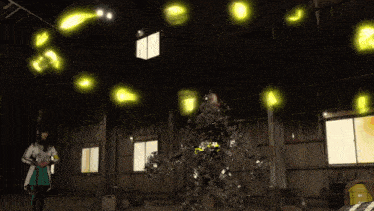 a person is standing in a dark room with a pink and yellow explosion coming out of their chest