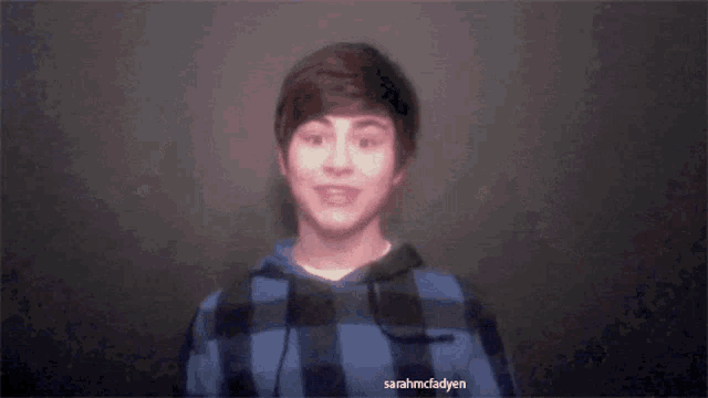 a blurry picture of a person with the name sarahmcfadyen written on the bottom