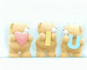 three teddy bears standing next to each other holding the letter u