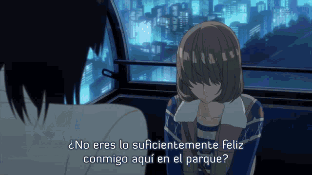a girl in a ferris wheel is talking to another girl in spanish