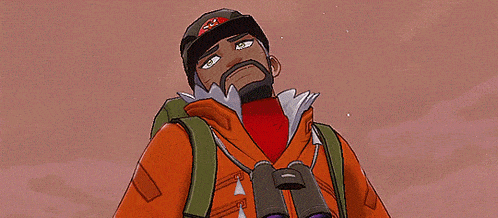 a man with a backpack is wearing a helmet and gloves and smiling .