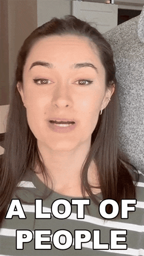 a woman says " a lot of people " while wearing a striped shirt