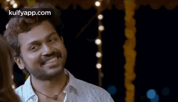 Head Shaking With A Smile.Gif GIF - Head Shaking With A Smile Karthi Smiling GIFs