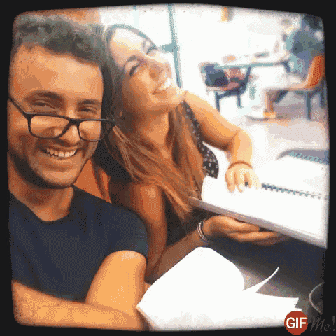 a man and a woman are posing for a picture with a gif me watermark